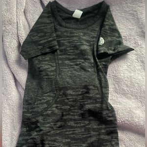 Two TKEQ ridding shirts